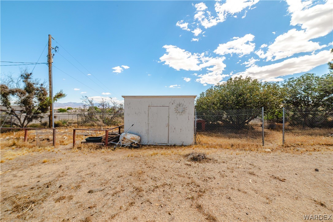 2100 East Valley View Road Kingman, AZ 86409 - Photo 47 of 53 Detached storage shed with a single entry door