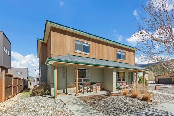 a front view of a house with patio