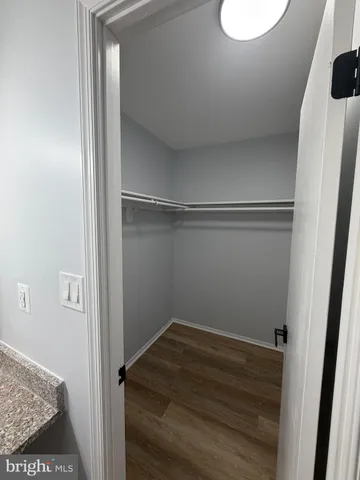 a room with a bed and a view of bathroom