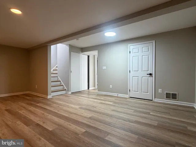 a bathroom with a toilet a sink and shower