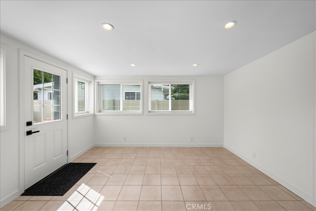 10802 Deshire Place Culver City, CA 90230 - Photo 21 of 50 a view of an empty room with a window