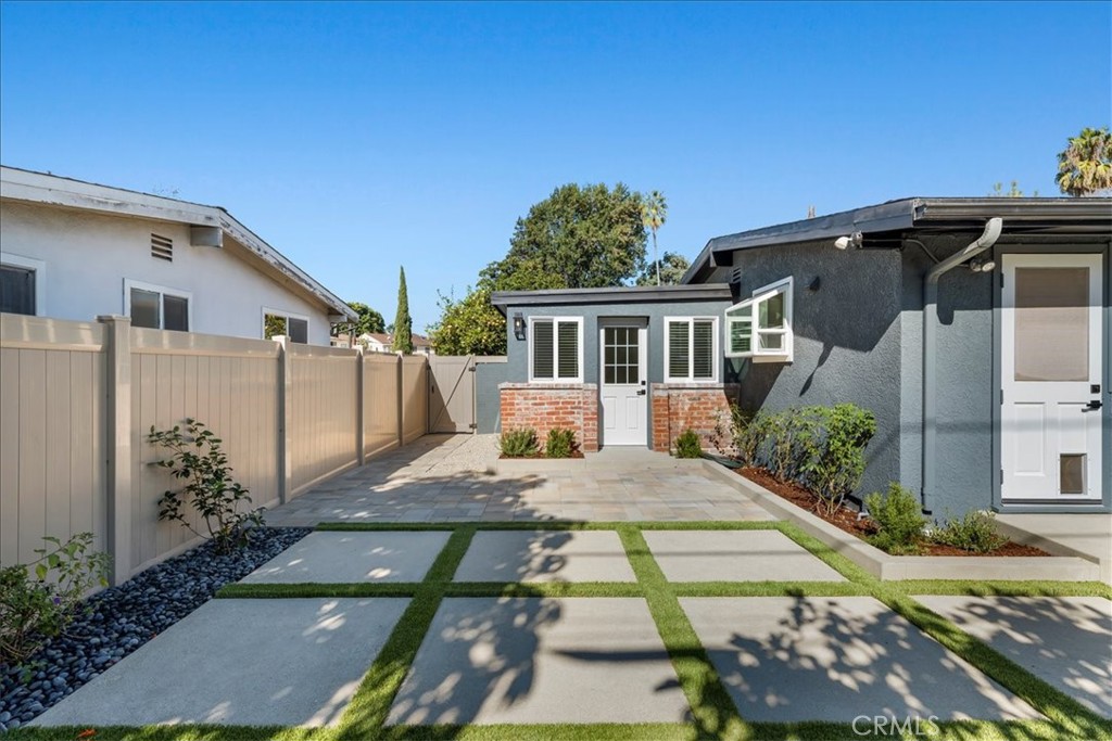 10802 Deshire Place Culver City, CA 90230 - Photo 28 of 50 a view of a house with a yard