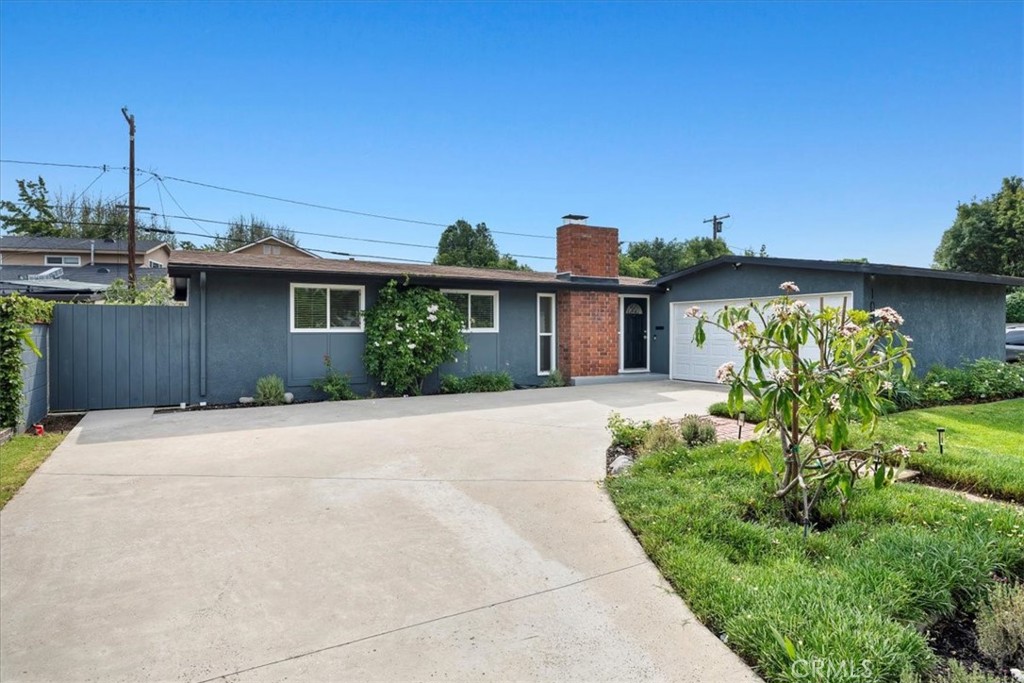 10802 Deshire Place Culver City, CA 90230 - Photo 47 of 50 a front view of a house with a yard