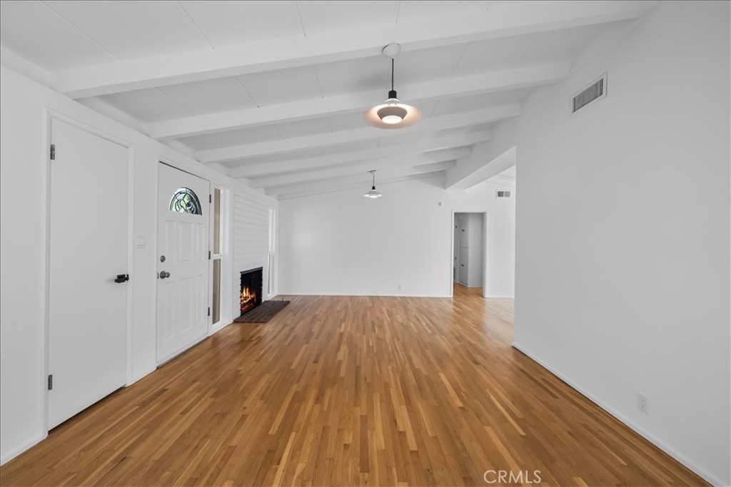 10802 Deshire Place Culver City, CA 90230 - Photo 8 of 50 a view of empty room with wooden floor