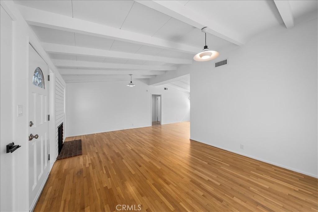 10802 Deshire Place Culver City, CA 90230 - Photo 9 of 50 a view of a livingroom with wooden floor and staircase