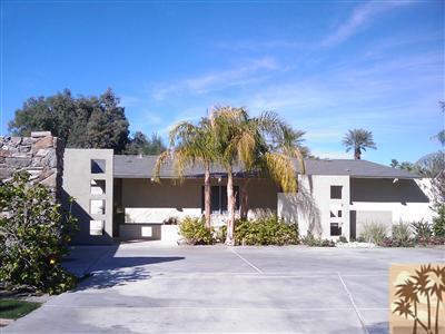 79350 4 Paths Lane Bermuda Dunes, CA 92203 - Photo 1 of 24 front view of a house with a yard and potted plants