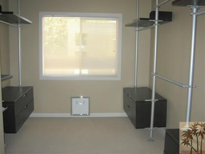 79350 4 Paths Lane Bermuda Dunes, CA 92203 - Photo 14 of 24 a bathroom with a window and a shower