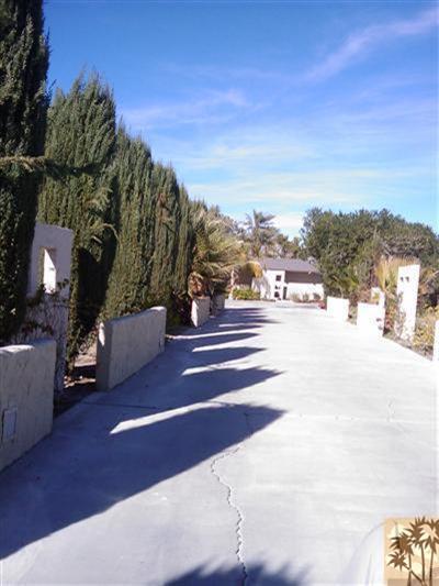 79350 4 Paths Lane Bermuda Dunes, CA 92203 - Photo 2 of 24 a view of a city street from a building