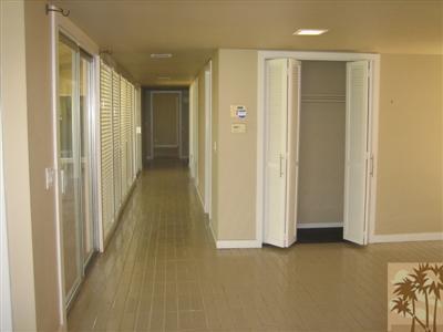 79350 4 Paths Lane Bermuda Dunes, CA 92203 - Photo 9 of 24 a view of a hallway with wooden floor