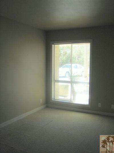 79350 4 Paths Lane Bermuda Dunes, CA 92203 - Photo 10 of 24 an empty room with a window