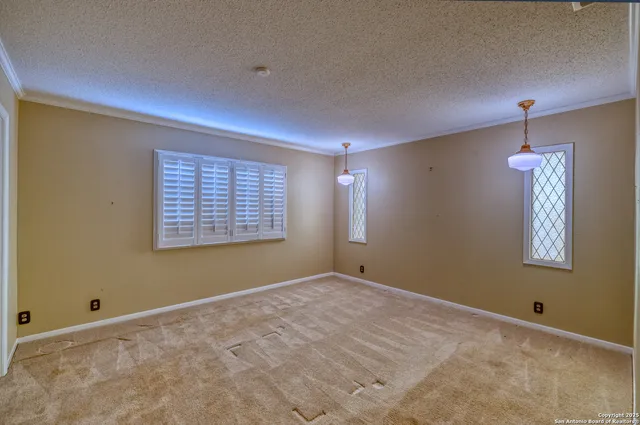 an empty room with windows