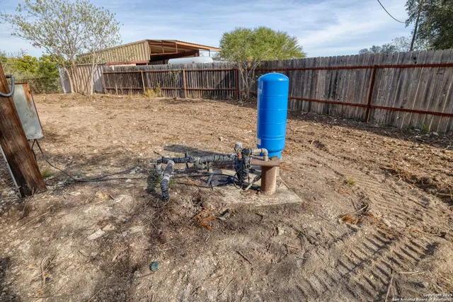 an aerial view of house with yard