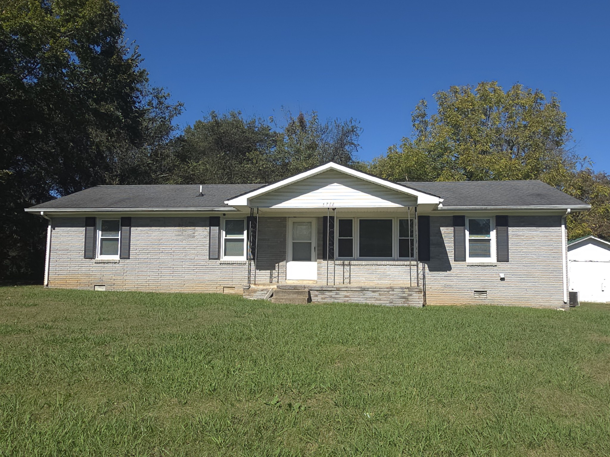5788 George Franklin Road Smyrna, TN 37167 - Photo 1 of 1 a front view of a house with a yard and trees