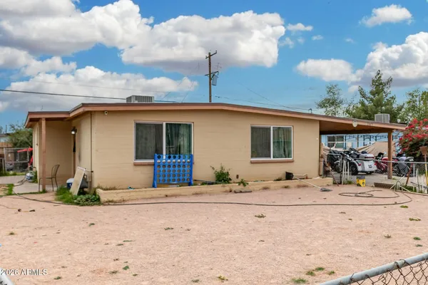a front view of a house with a patio
