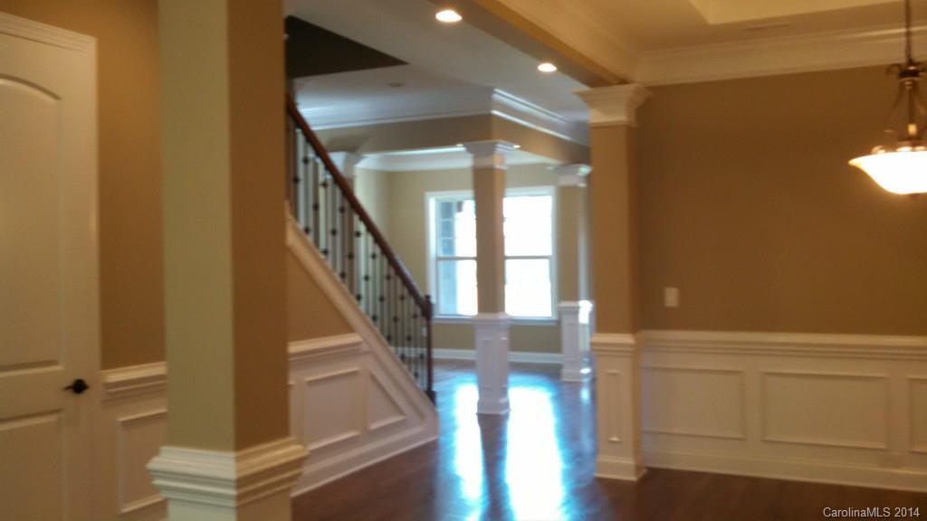 8145 Clems Branch Road Indian Land, SC 29707 - Photo 5 of 14 a view of entryway and hall with wooden floor