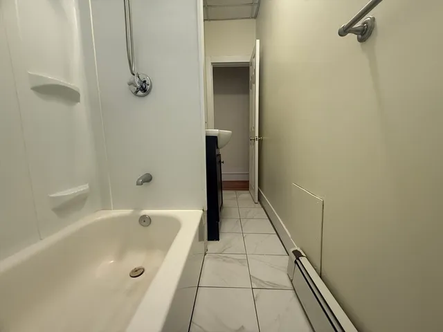 a bathroom with a bathtub