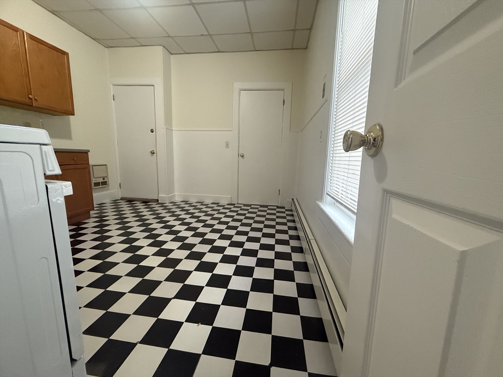 48 Florence Street, Unit 2 Somerville, MA 02145 - Photo 10 of 11 a black and white checkered floor with a black white checkered floor