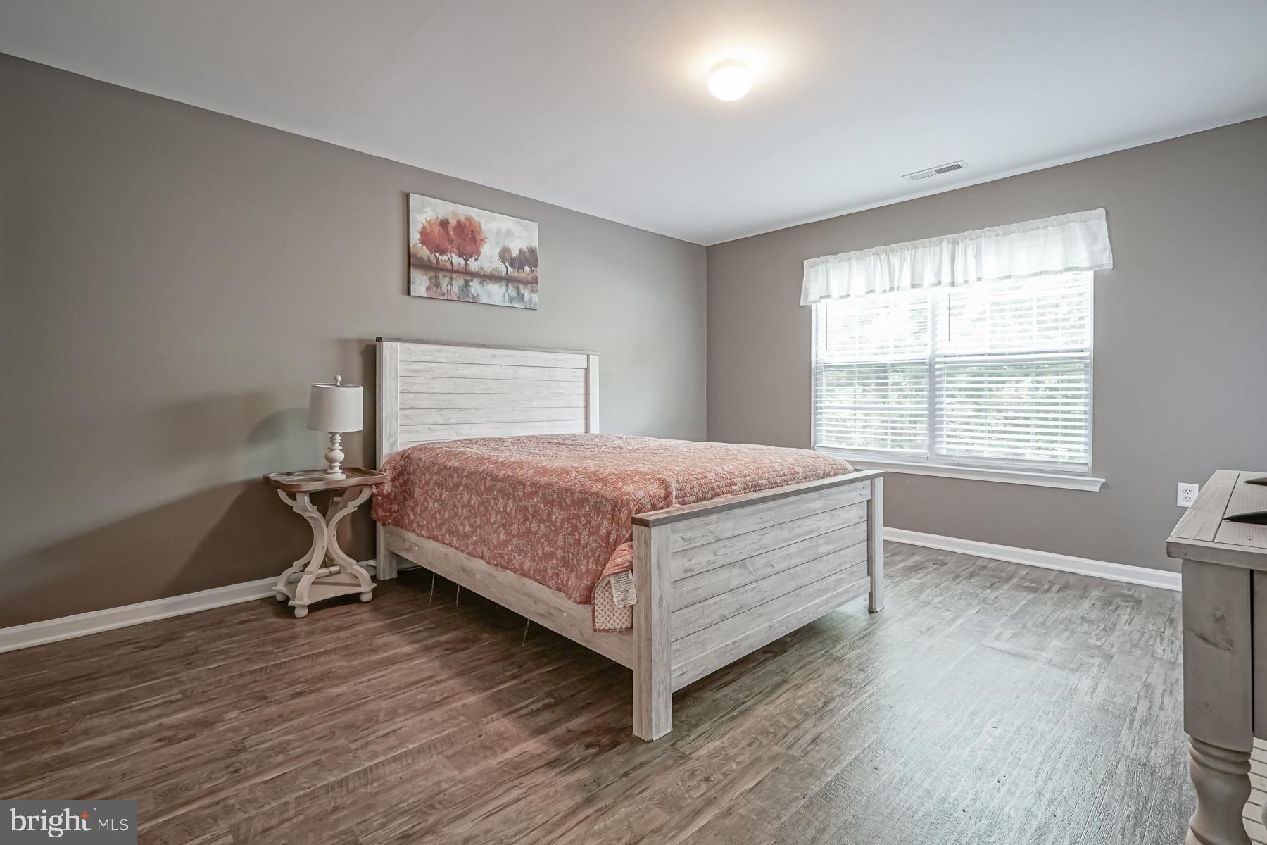 307 Red Bud Lane Mantua, NJ 08051 - Photo 12 of 21 a bedroom with a bed and a window