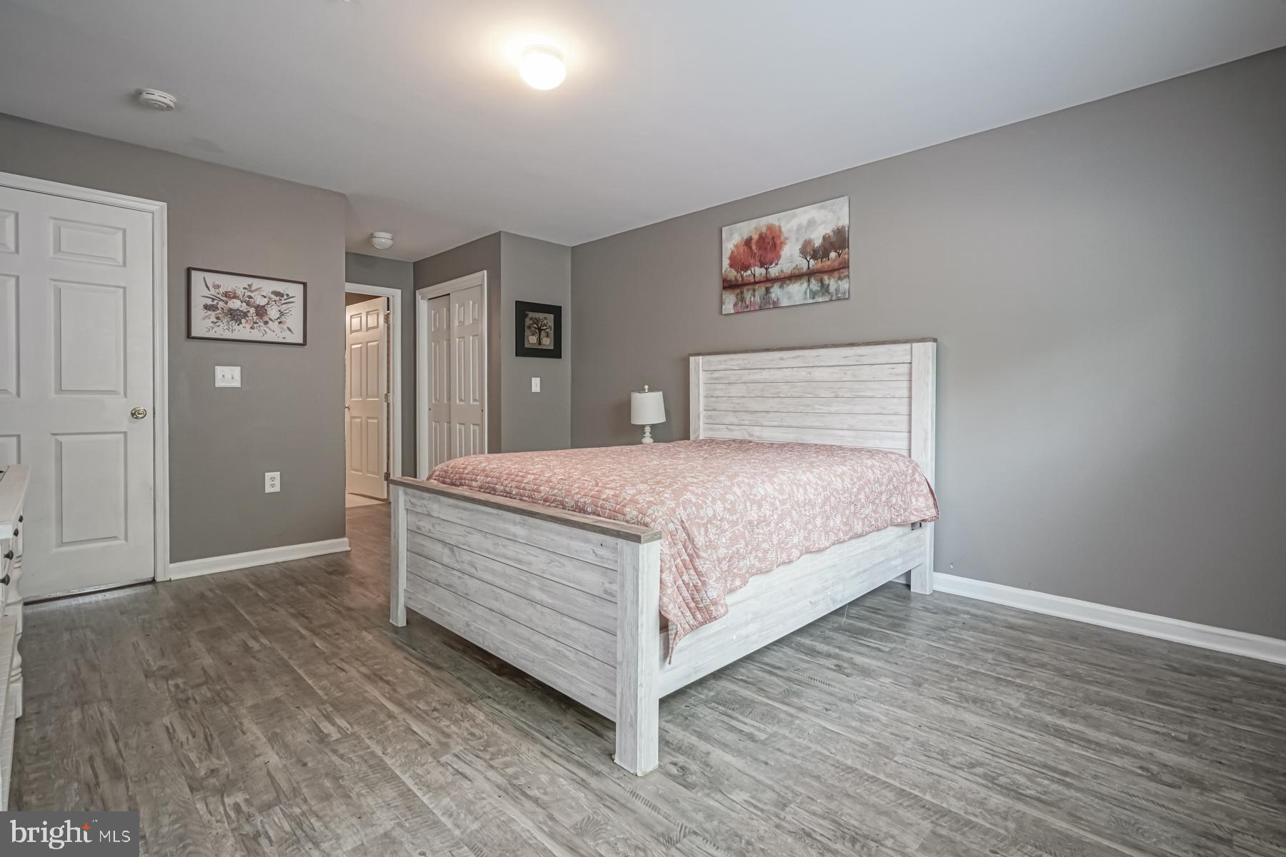 307 Red Bud Lane Mantua, NJ 08051 - Photo 13 of 21 a bedroom with a bed and painting on the wall