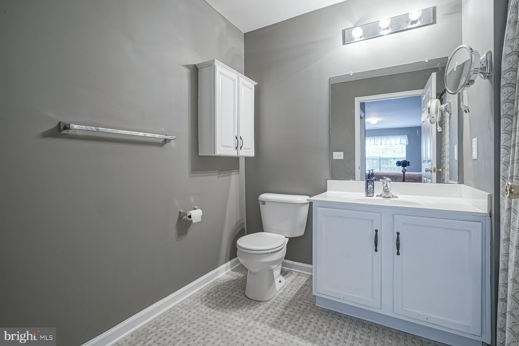 307 Red Bud Lane Mantua, NJ 08051 - Photo 15 of 21 a bathroom with a sink toilet and a mirror