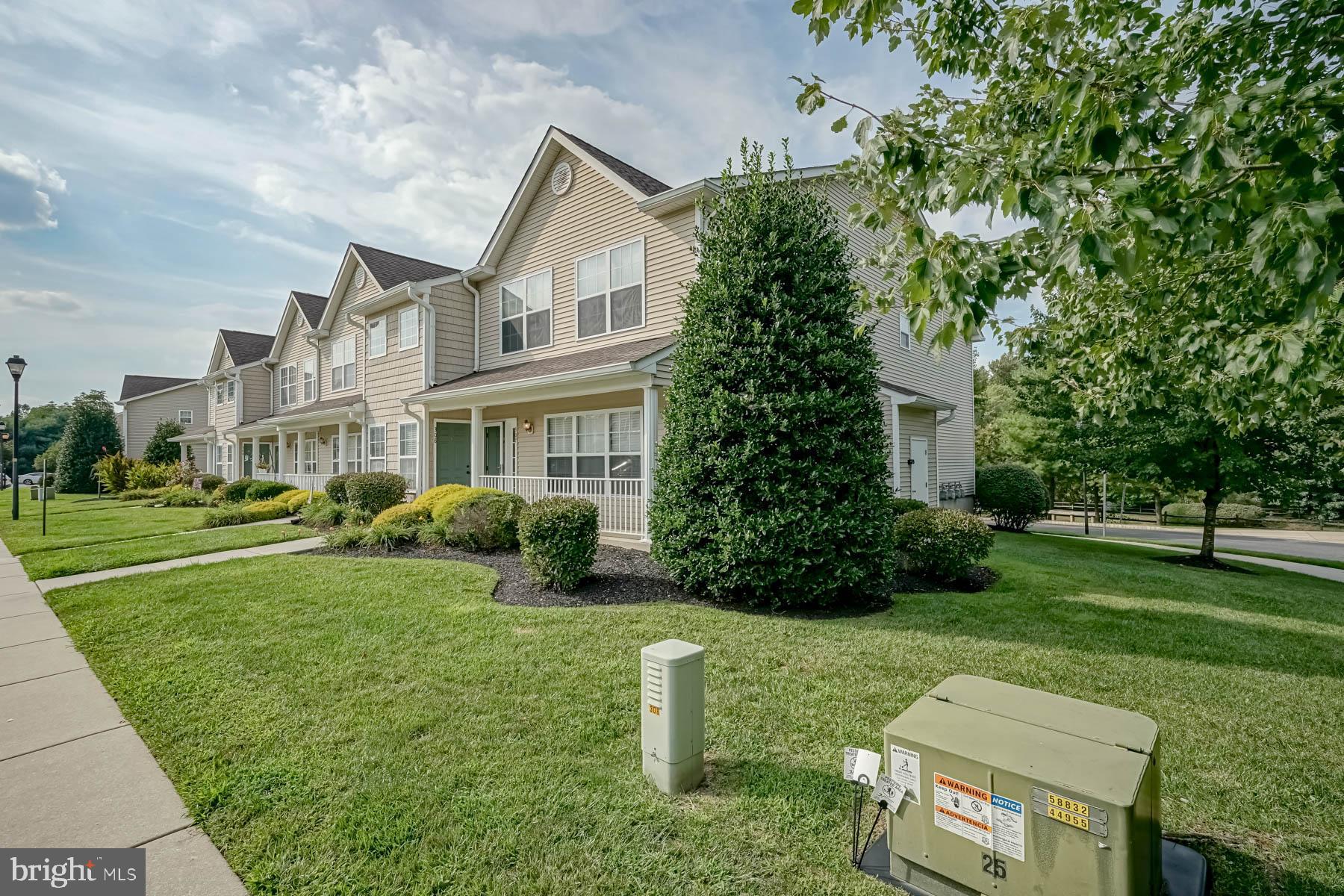 307 Red Bud Lane Mantua, NJ 08051 - Photo 20 of 21 a front view of a house with a yard
