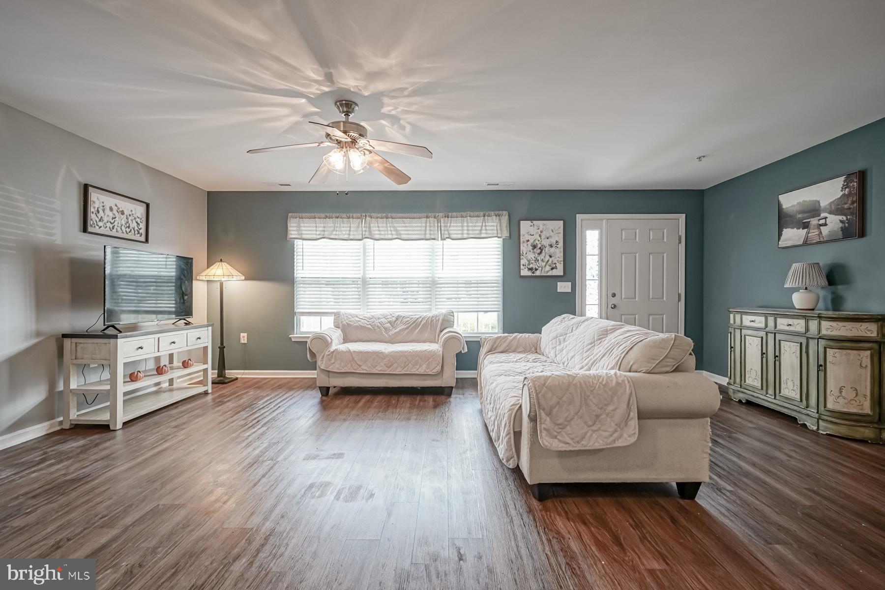 307 Red Bud Lane Mantua, NJ 08051 - Photo 5 of 21 a living room with furniture and a wooden floor