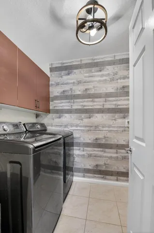 a view of a room with wooden floor and window