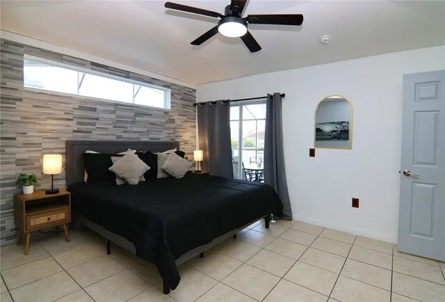 a bathroom with a sink mirror vanity and toilet