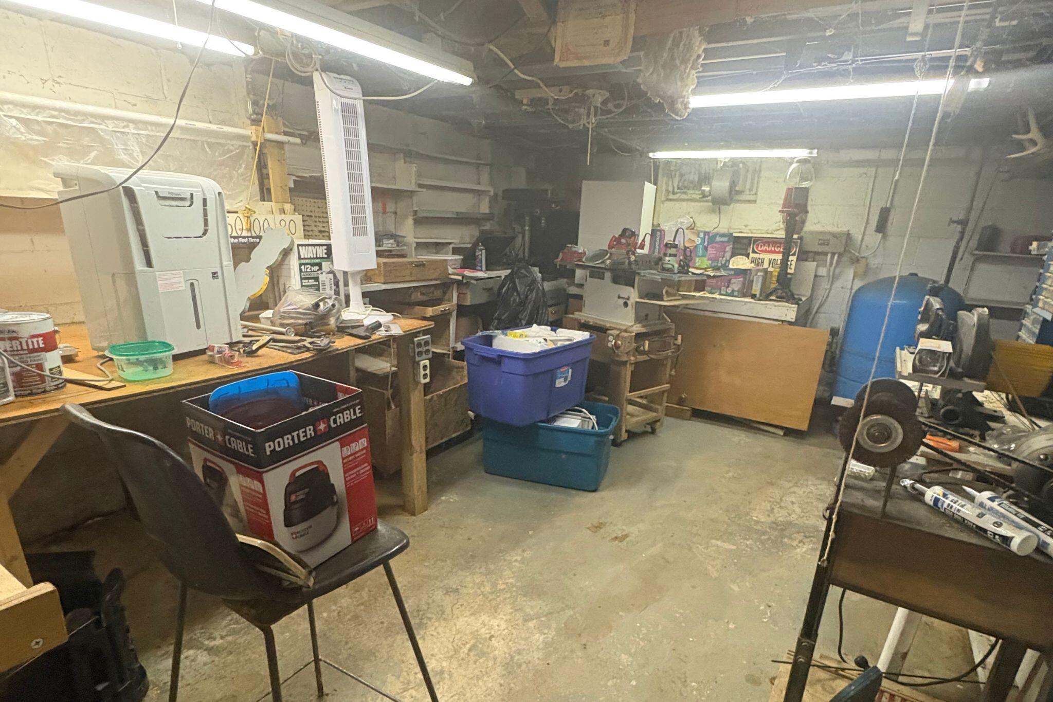 8311 7 Mile Road Caledonia, WI 53108 - Photo 13 of 25 Basement workshop