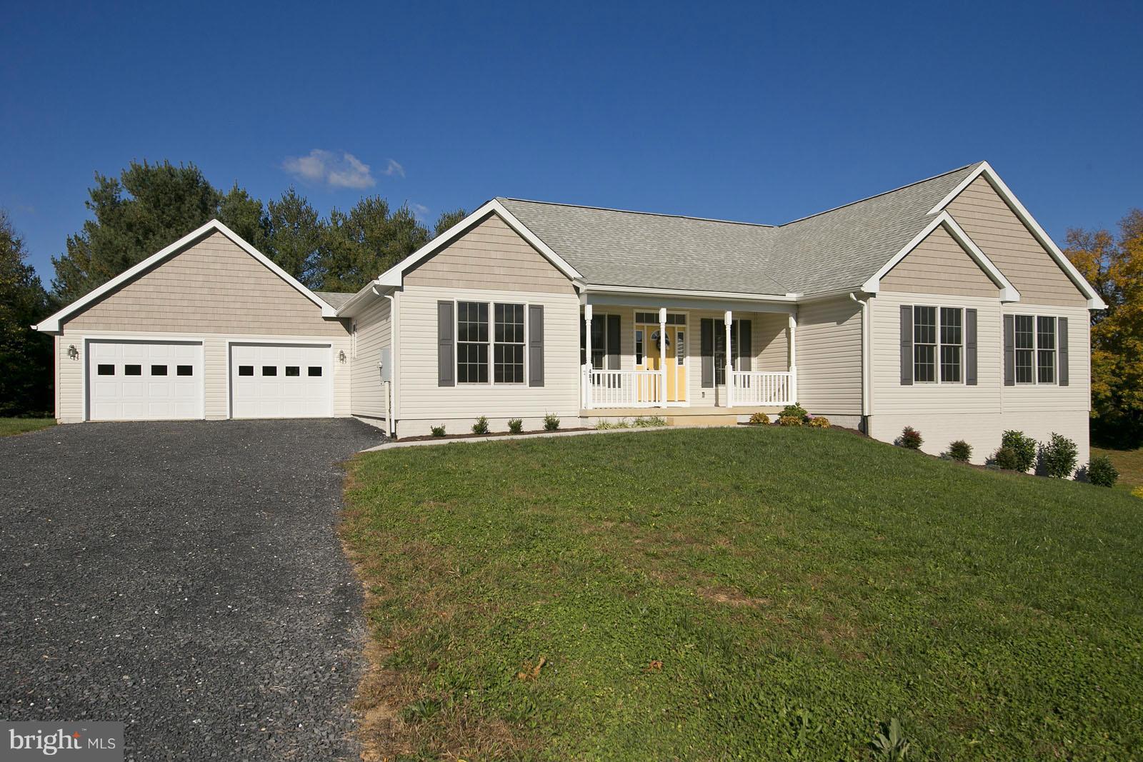 481 Bowling View Road Front Royal, VA 22630 - Photo 2 of 30 a view of a white house with a big yard and large trees