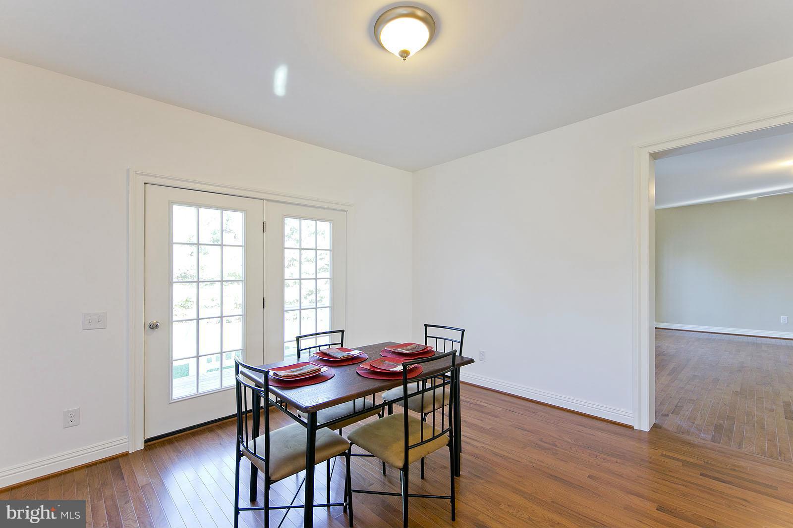 481 Bowling View Road Front Royal, VA 22630 - Photo 14 of 30 a view of a dining room with furniture and wooden floor