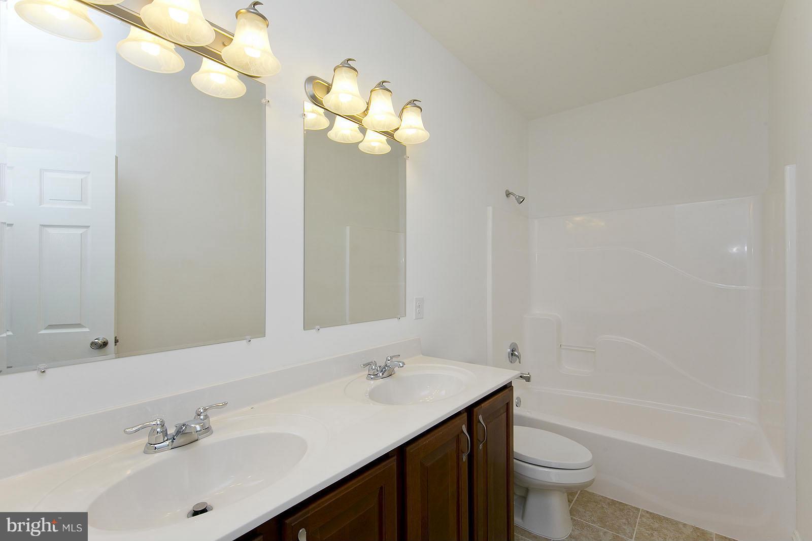 481 Bowling View Road Front Royal, VA 22630 - Photo 17 of 30 a bathroom with a sink a toilet and a bathtub
