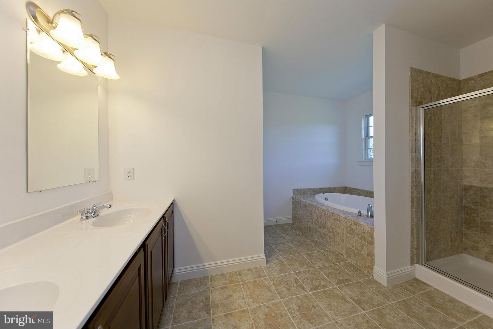 481 Bowling View Road Front Royal, VA 22630 - Photo 23 of 30 a bathroom with a granite countertop sink a toilet and shower