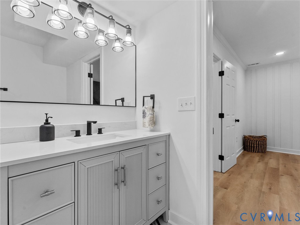 7361 Creek Ridge Road Henrico, VA 23231 - Photo 26 of 51 Vanity with a light-toned countertop, undermount s