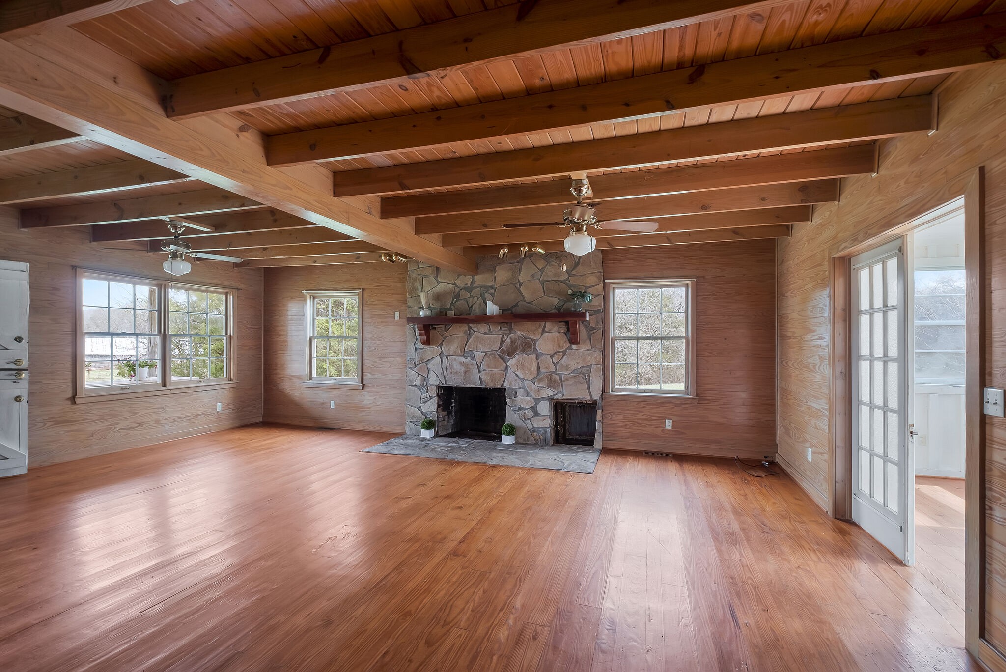 198 Treece Lane Waynesboro, TN 38485 - Photo 11 of 69 a view of an empty room with wooden floor and a window
