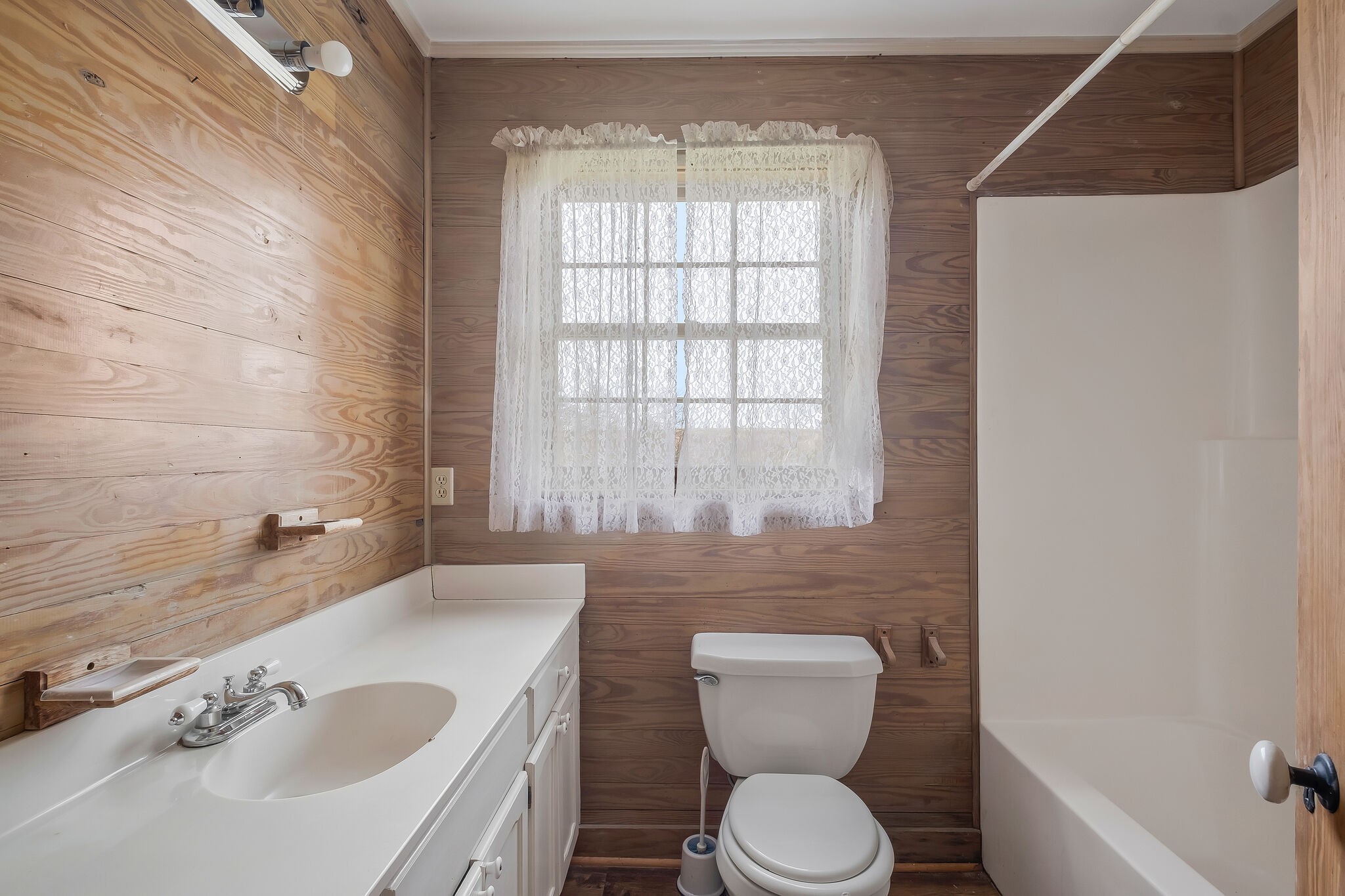 198 Treece Lane Waynesboro, TN 38485 - Photo 16 of 69 a bathroom with a sink a toilet and a bathtub