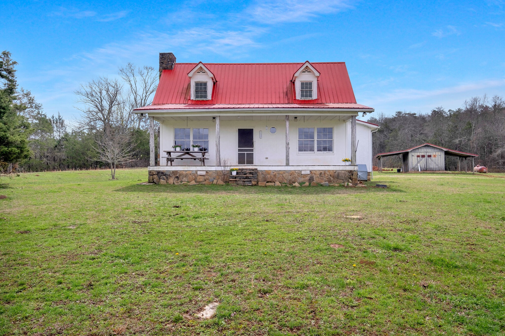 198 Treece Lane Waynesboro, TN 38485 - Photo 4 of 69 a view of a building with an outdoor space