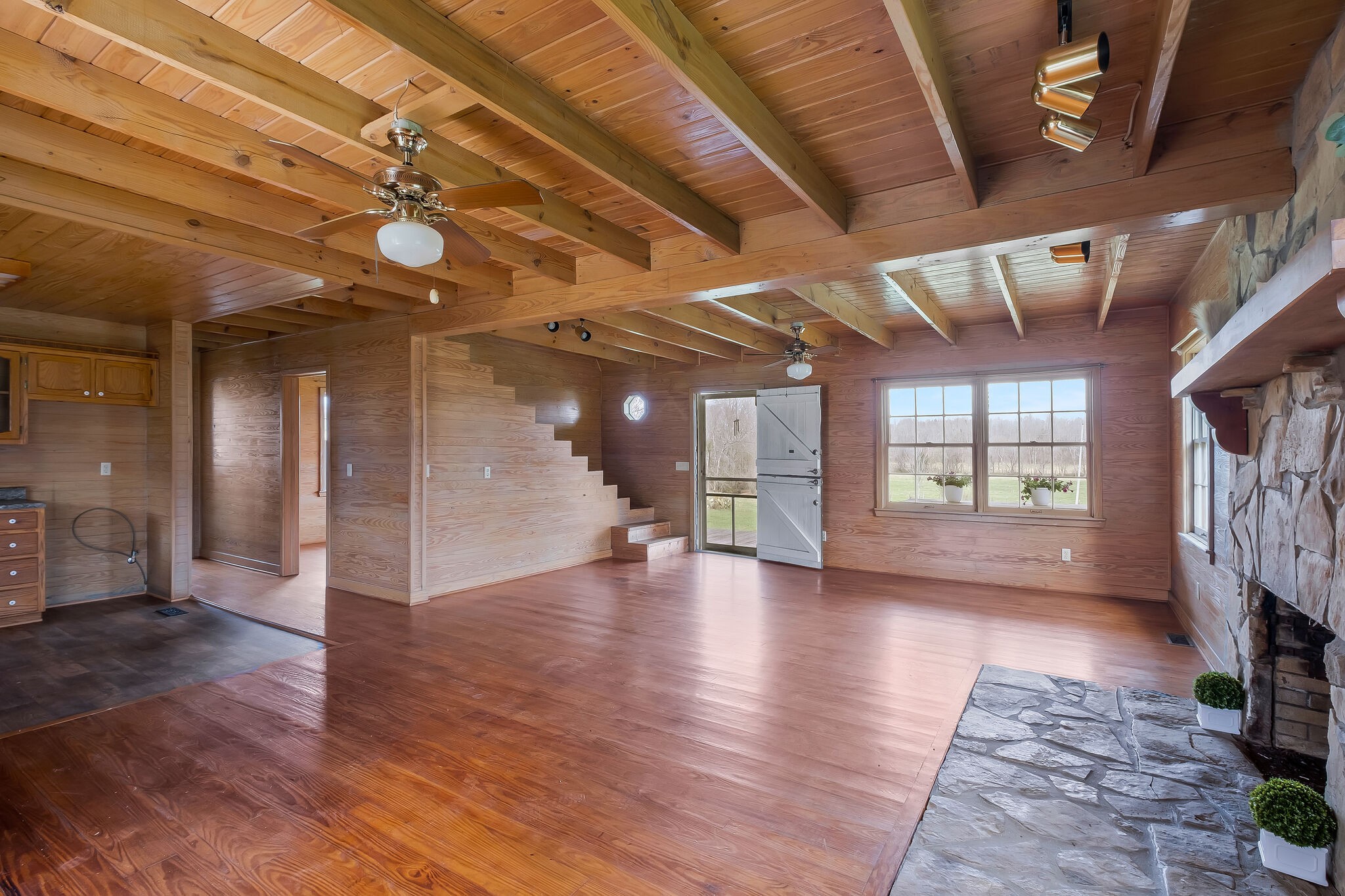 198 Treece Lane Waynesboro, TN 38485 - Photo 9 of 69 a view of empty room with wooden floor