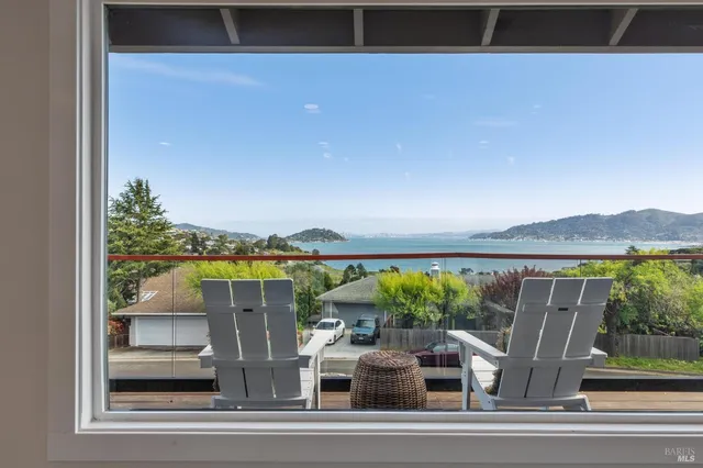 a view of swimming pool from a balcony