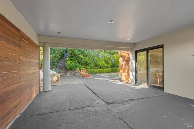 a view of a room with a large window