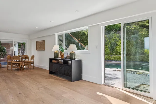 a living room with furniture and windows