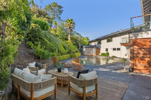 a view of yard with patio