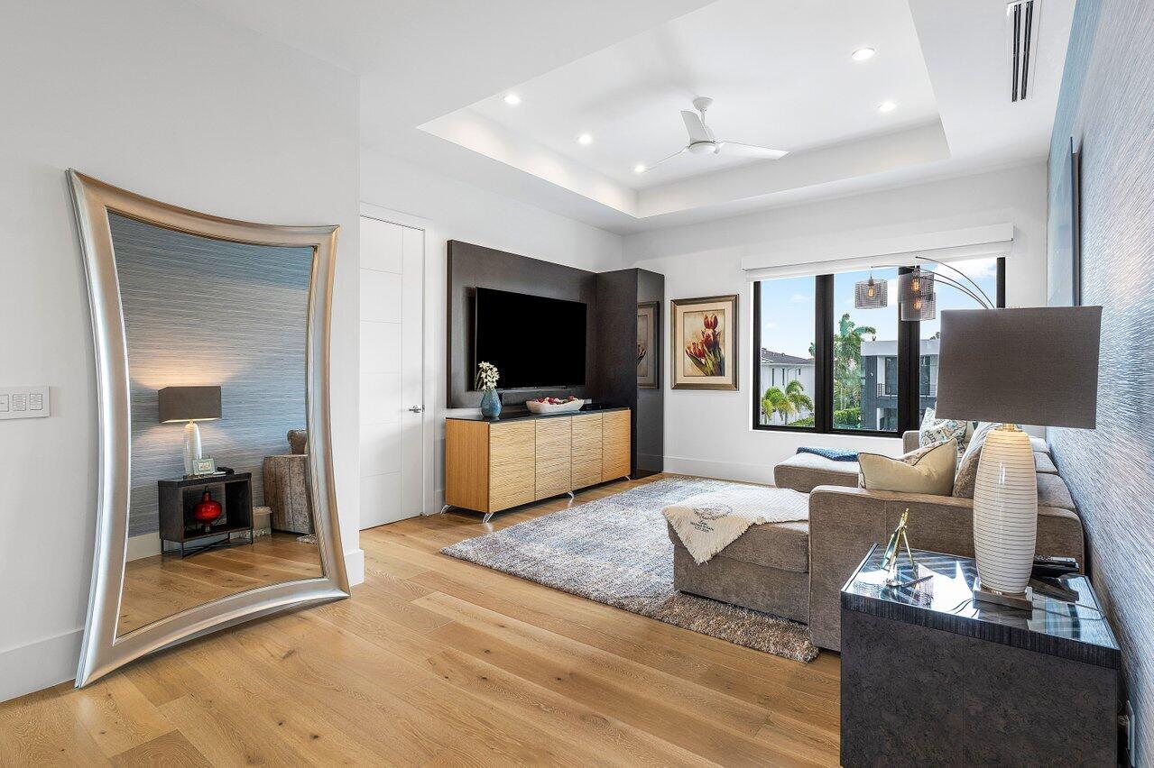 680 Marine Drive Boca Raton, FL 33431 - Photo 19 of 42 a living room with furniture and a flat screen tv