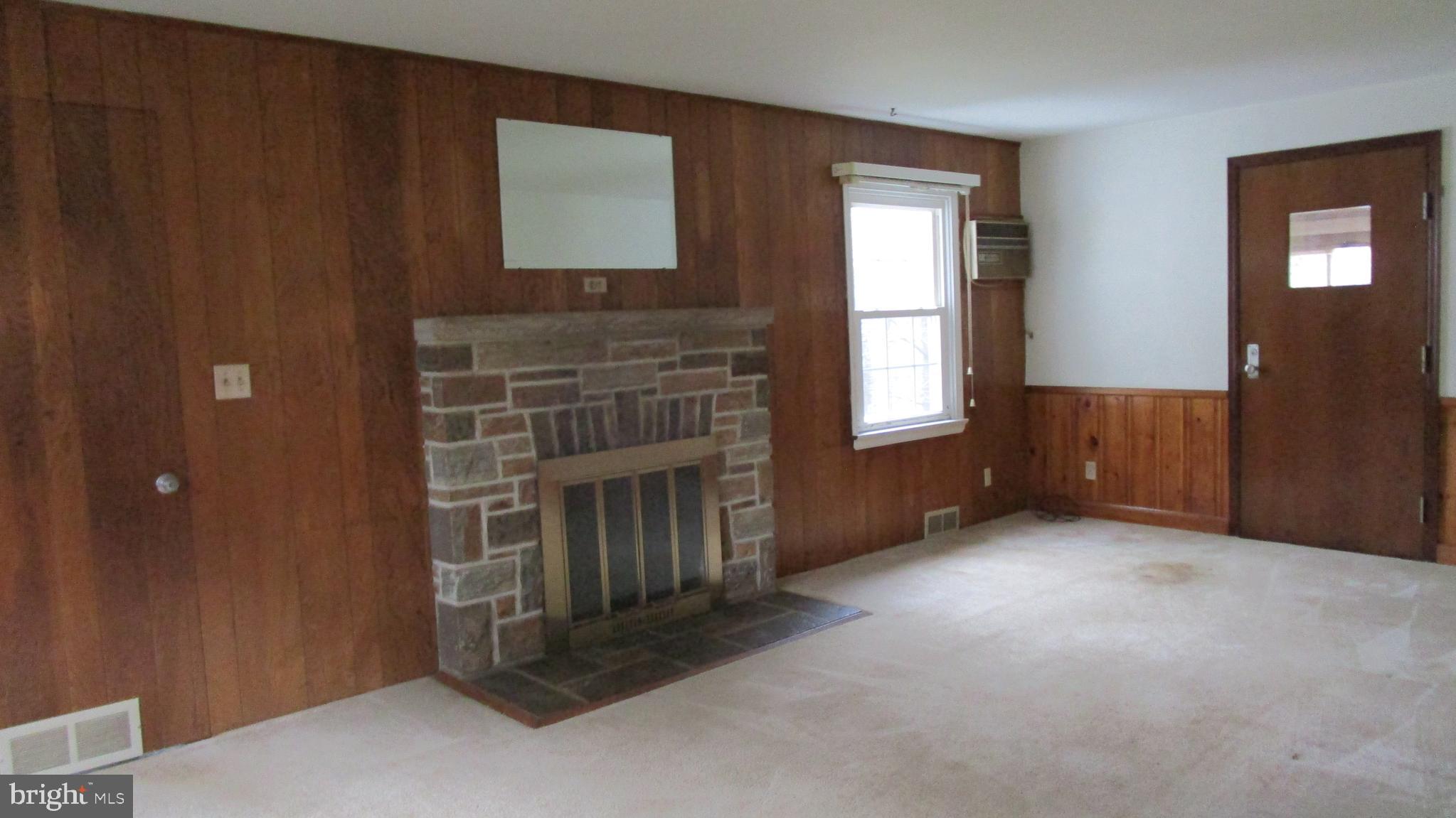 2412 Putnam Road Forest Hill, MD 21050 - Photo 12 of 27 Living room with hardwood under carpet