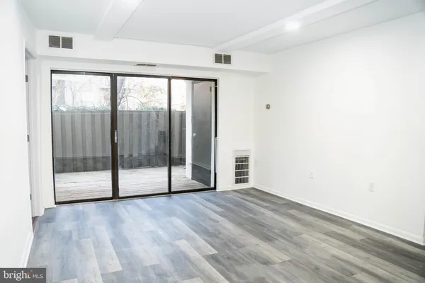 a view of entryway with wooden floor