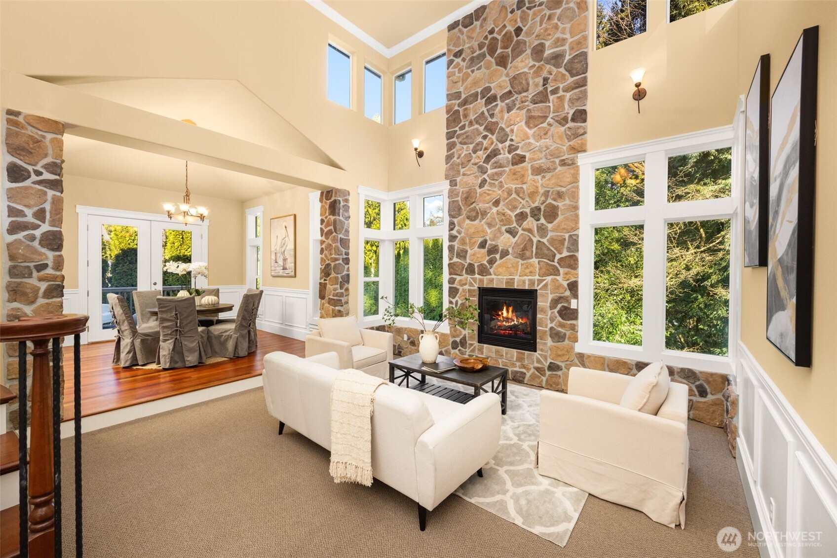 18638 92nd Avenue Northeast Bothell, WA 98011 - Photo 2 of 40 a living room with furniture large window and a fireplace