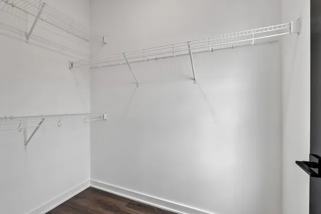 a view of a room with racks on the wall