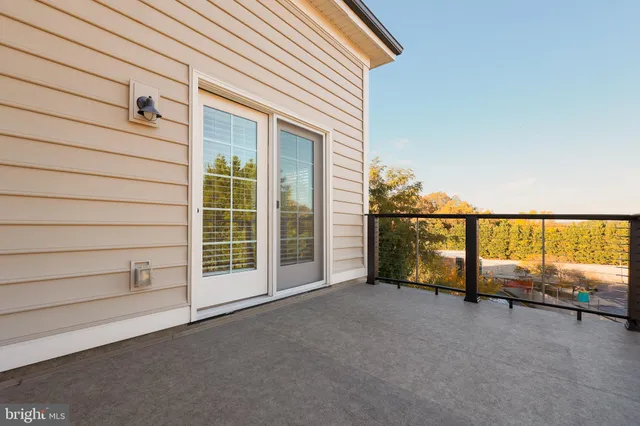 a view of an empty room with a balcony