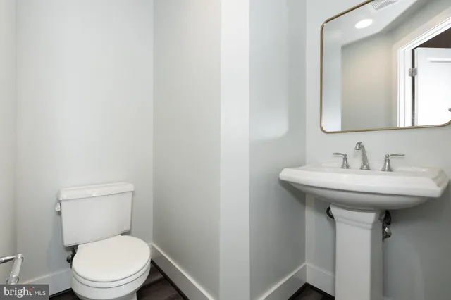 a bathroom with a sink and a toilet