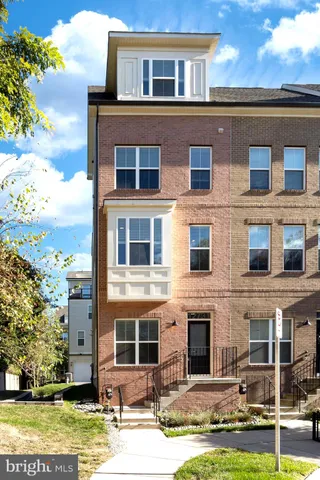 a front view of a building with street view